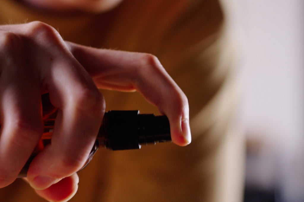 finger in action using a spray bottle lifestyle by clive coffee