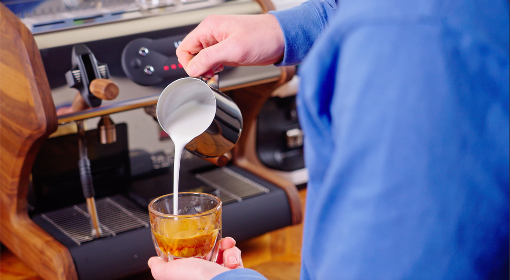 Talent pouring latte art lifestyle by Clive Coffee