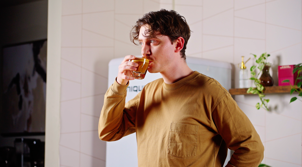 talent tasting an oat milk beverage lifestyle by clive coffee